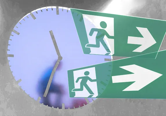 Psychische Belastungen: Uhr und Fluchtwegschilder